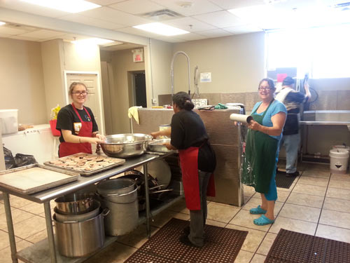 Sandy Pitman with her Daughter Helping out in the kitchen